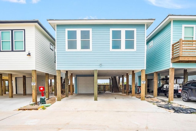 view of front of property featuring a carport