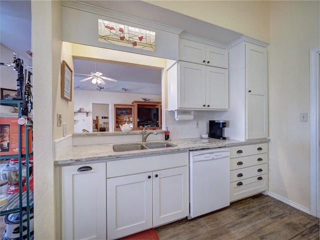 kitchen featuring white cabinetry, dishwasher, ceiling fan, sink, and decorative backsplash