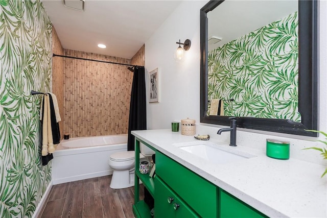 full bathroom with toilet, vanity, shower / bath combination with curtain, and hardwood / wood-style flooring