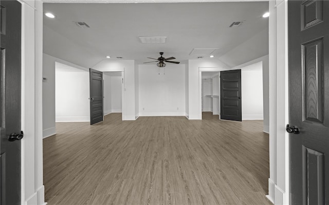 514 W 4th St, Sinton, TX 78387 - empty room featuring vaulted ceiling, a ceiling fan, wood finished floors, baseboards, and recessed lighting