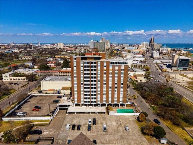 birds eye view of property featuring a city view