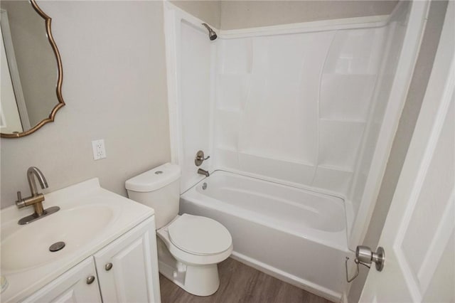 105 E Cornwall St, Rockport, TX 78382 - bathroom with shower / tub combination, toilet, vanity, and wood finished floors