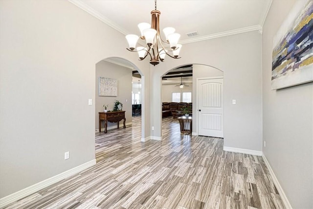 dining space featuring arched walkways, visible vents, a chandelier, and light wood finished floors