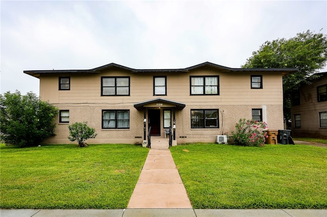 view of front of home featuring a front lawn