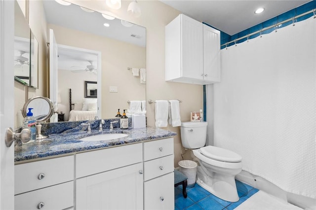 ensuite bathroom featuring visible vents, toilet, ensuite bathroom, ceiling fan, and vanity