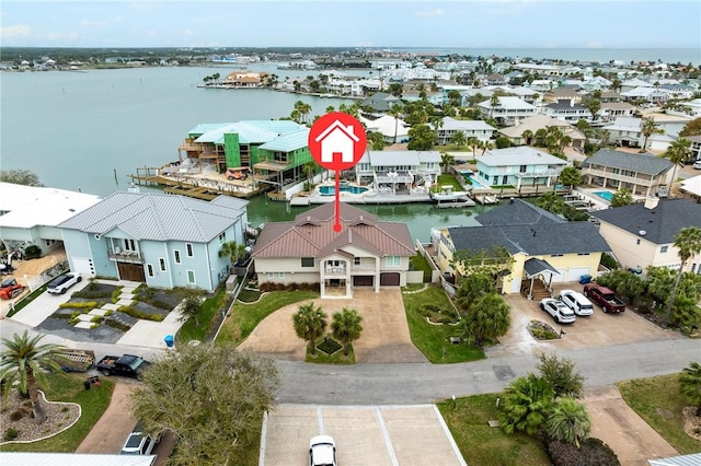 aerial view featuring a residential view and a water view