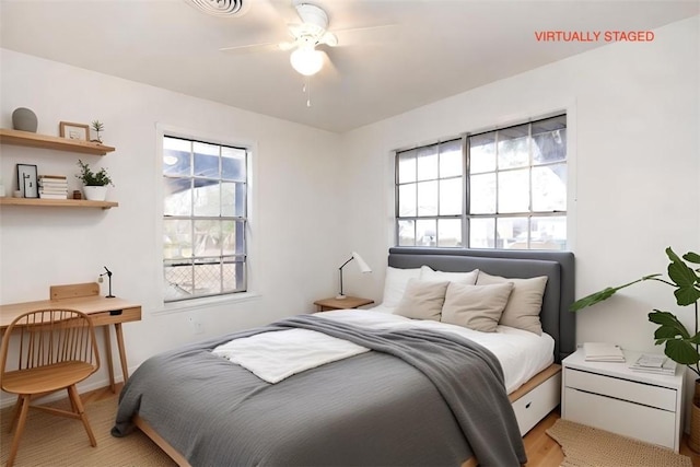 bedroom featuring ceiling fan