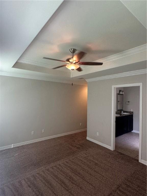 2818 Lake Rhapsody Dr, Corpus Christi, TX 78414 - carpeted spare room featuring a raised ceiling, a ceiling fan, and ornamental molding