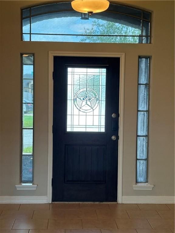 2818 Lake Rhapsody Dr, Corpus Christi, TX 78414 - tiled entryway featuring baseboards
