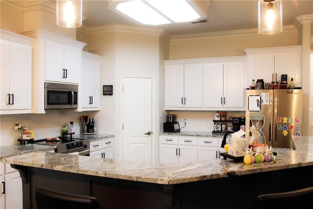 6834 Boardwalk Ave, Corpus Christi, TX 78414 - kitchen featuring a breakfast bar area, white cabinets, appliances with stainless steel finishes, and light stone counters