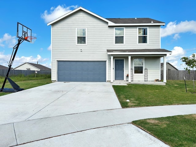 front facade featuring a front lawn and a garage