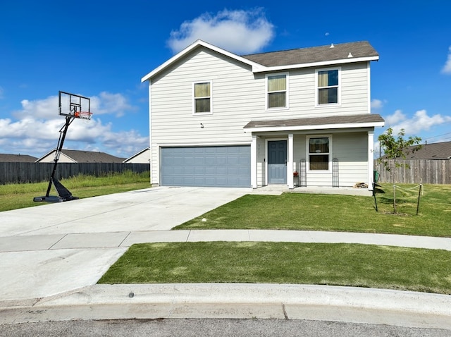 view of front of house featuring covered porch, a garage, and a front yard