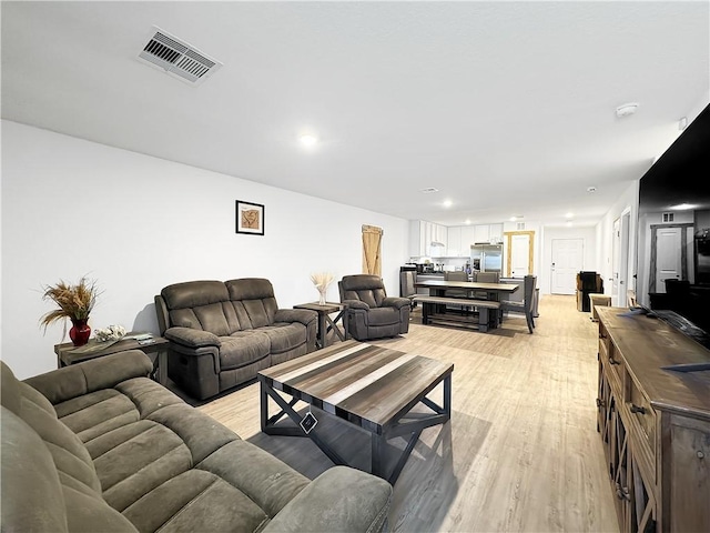 living room featuring light hardwood / wood-style floors