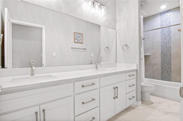 full bathroom featuring toilet, shower / bath combo, and vanity