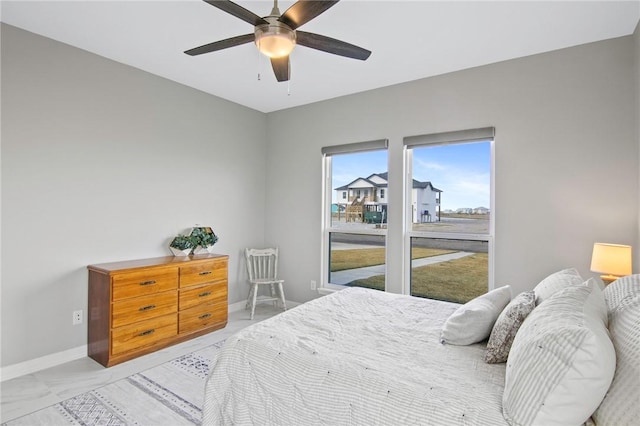 bedroom featuring ceiling fan