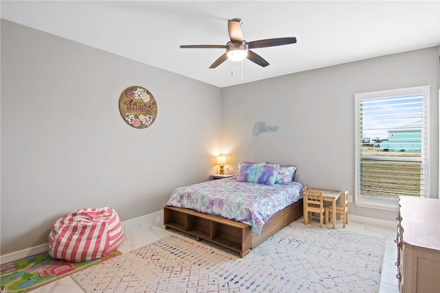 bedroom featuring ceiling fan