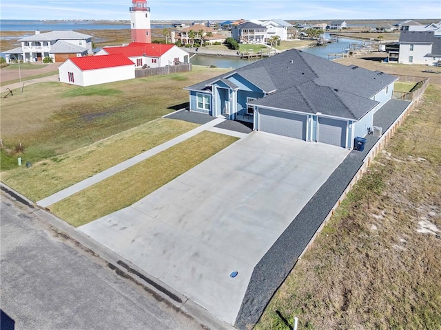 aerial view featuring a water view