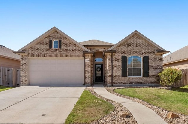 view of front of property featuring brick siding, a front lawn, fence, concrete driveway, and an attached garage