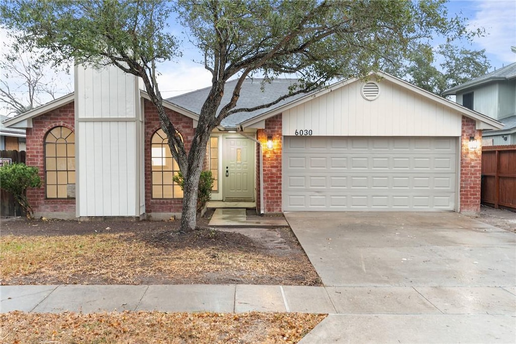 view of front of property with a garage