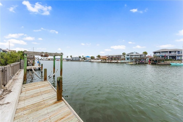 dock area with a water view