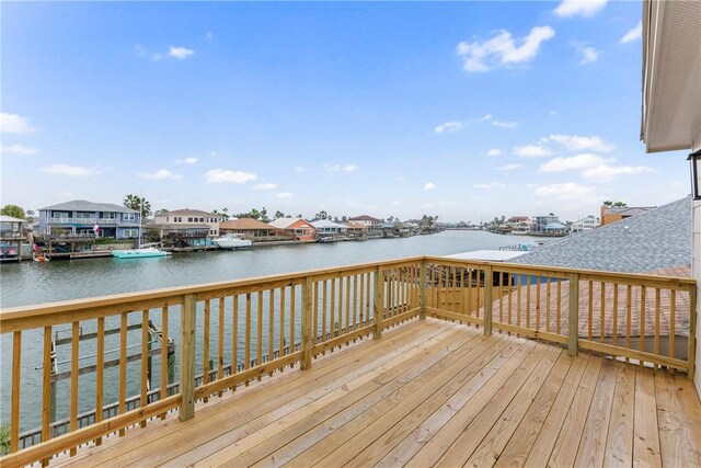 view of dock featuring a deck with water view