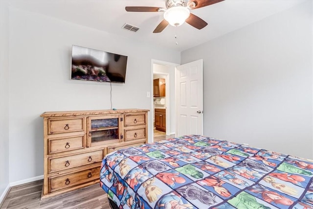 109 Misty Ln, Aransas Pass, TX 78336 - bedroom featuring light wood-type flooring, baseboards, and a ceiling fan