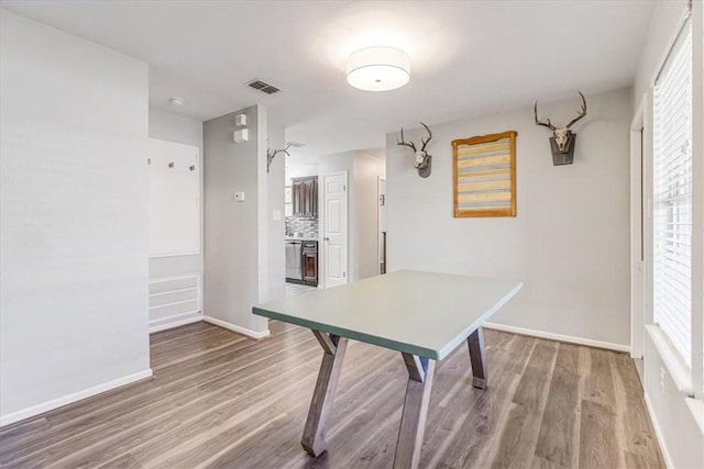 109 Misty Ln, Aransas Pass, TX 78336 - dining area featuring wood finished floors and baseboards