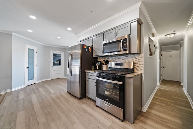 kitchen with tasteful backsplash, crown molding, stainless steel appliances, light stone countertops, and light hardwood / wood-style flooring