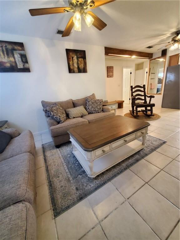 5701 Glen Arbor Dr, Corpus Christi, TX 78412 - living area featuring a ceiling fan and light tile patterned floors