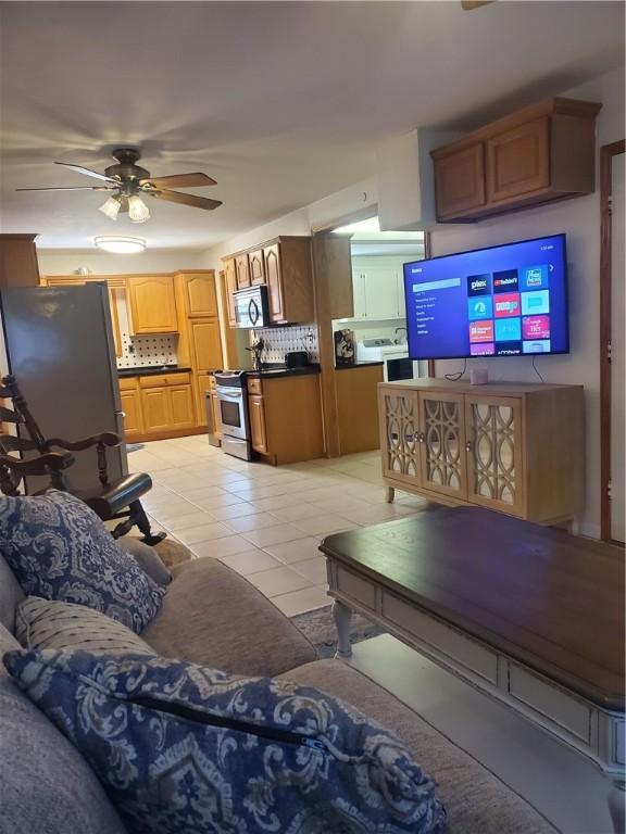5701 Glen Arbor Dr, Corpus Christi, TX 78412 - living room featuring ceiling fan and light tile patterned floors