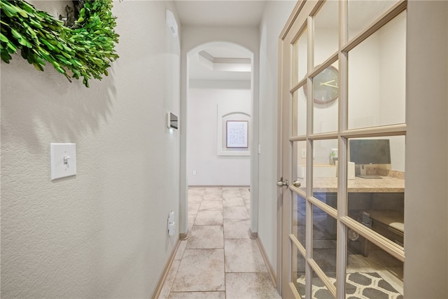 8130 Resplandor St, Corpus Christi, TX 78414 - hall featuring arched walkways and baseboards