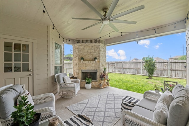 8130 Resplandor St, Corpus Christi, TX 78414 - view of patio with a ceiling fan and an outdoor living space with a fireplace