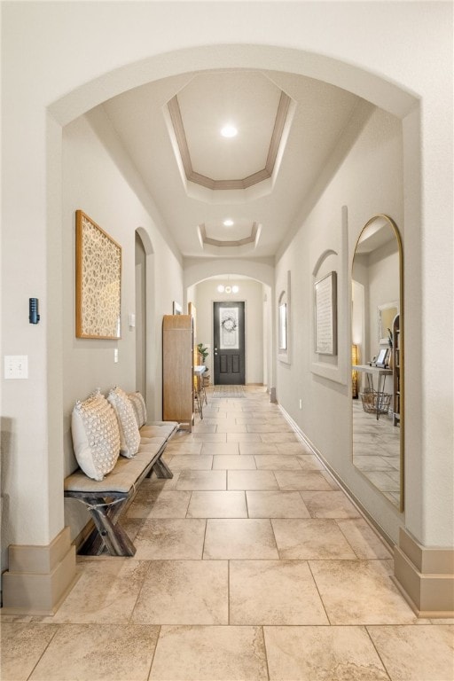 8130 Resplandor St, Corpus Christi, TX 78414 - entrance foyer with arched walkways, a raised ceiling, and ornamental molding