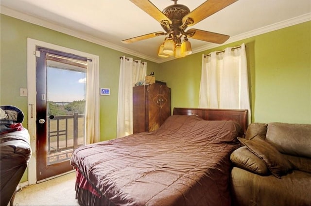 carpeted bedroom with access to exterior, ceiling fan, and crown molding