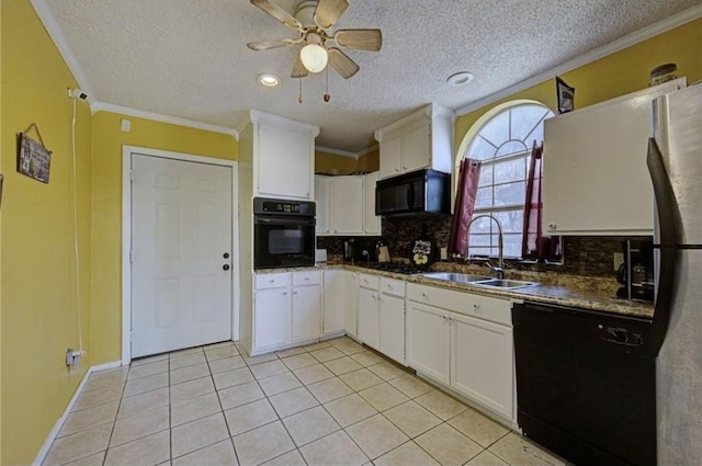 kitchen with black appliances, sink, ornamental molding, light tile patterned flooring, and white cabinetry