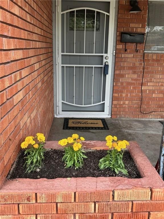 919 W W Ave Unit G, Kingsville, TX 78363 - property entrance featuring brick siding