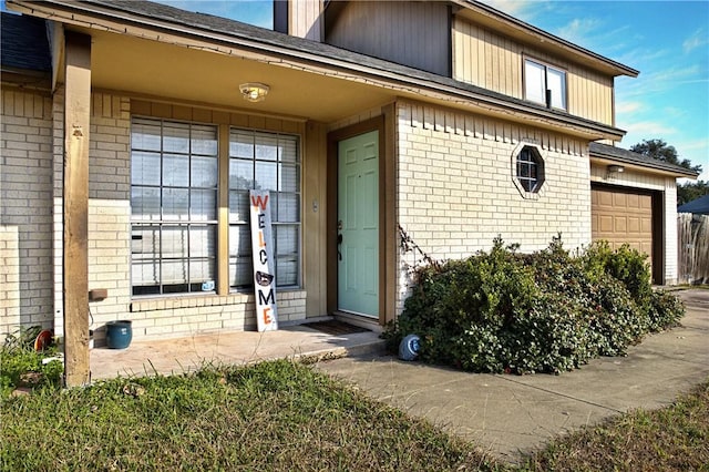 property entrance with a garage