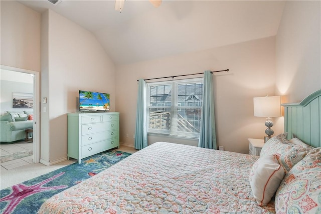 bedroom with carpet, ceiling fan, and vaulted ceiling