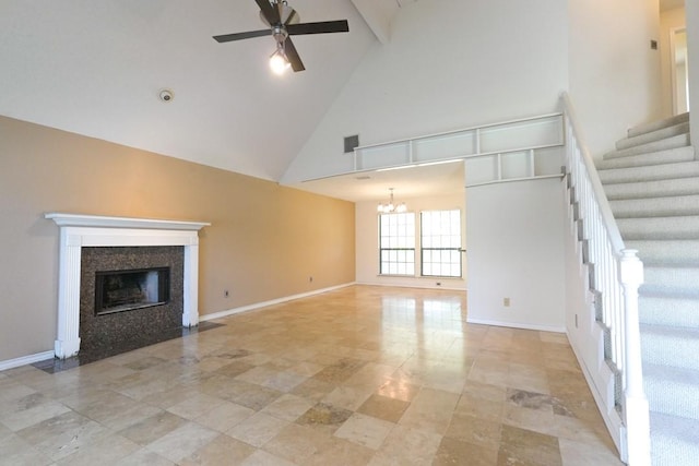 321 Long Pointe Dr, Portland, TX 78374 - unfurnished living room with high vaulted ceiling, a chandelier, a ceiling fan, a tile fireplace, and stairs