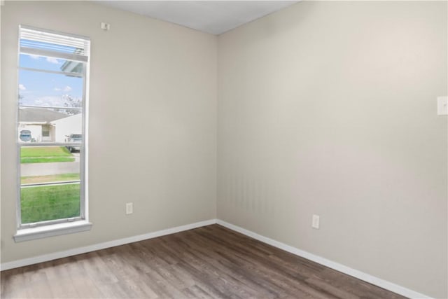 2809 Vancouver Dr, Corpus Christi, TX 78414 - spare room featuring baseboards and wood finished floors