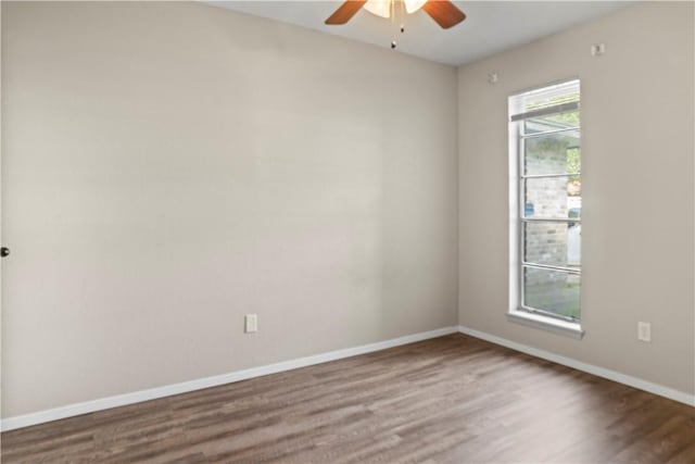 2809 Vancouver Dr, Corpus Christi, TX 78414 - empty room with ceiling fan, wood finished floors, and baseboards