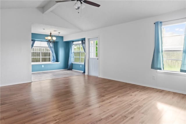 2809 Vancouver Dr, Corpus Christi, TX 78414 - empty room with a chandelier, a ceiling fan, wood finished floors, and baseboards