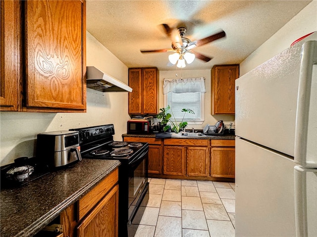 kitchen featuring custom exhaust hood, black appliances, ceiling fan, a textured ceiling, and sink