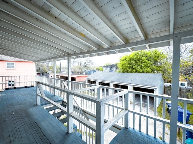 deck with an outbuilding