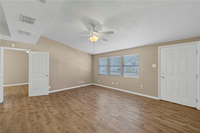 unfurnished living room with ceiling fan and light hardwood / wood-style floors