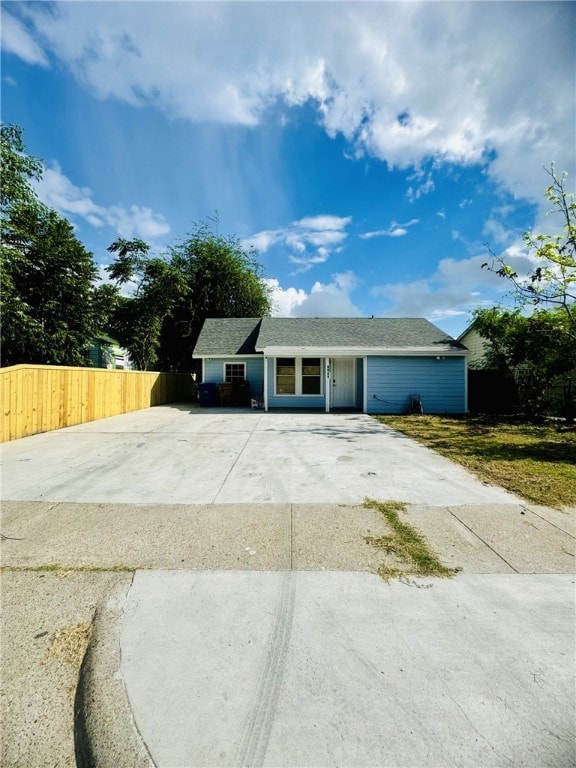 ranch-style home with a garage