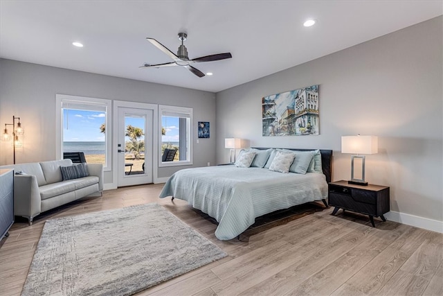 bedroom with light wood-style flooring, recessed lighting, a ceiling fan, baseboards, and access to exterior