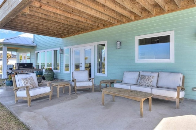 view of patio featuring a grill and an outdoor living space