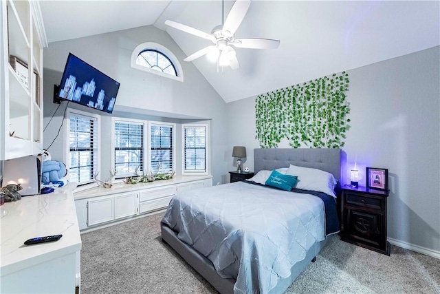 bedroom featuring light carpet, ceiling fan, and high vaulted ceiling