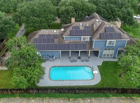 view of pool with a yard, a fenced in pool, and a patio